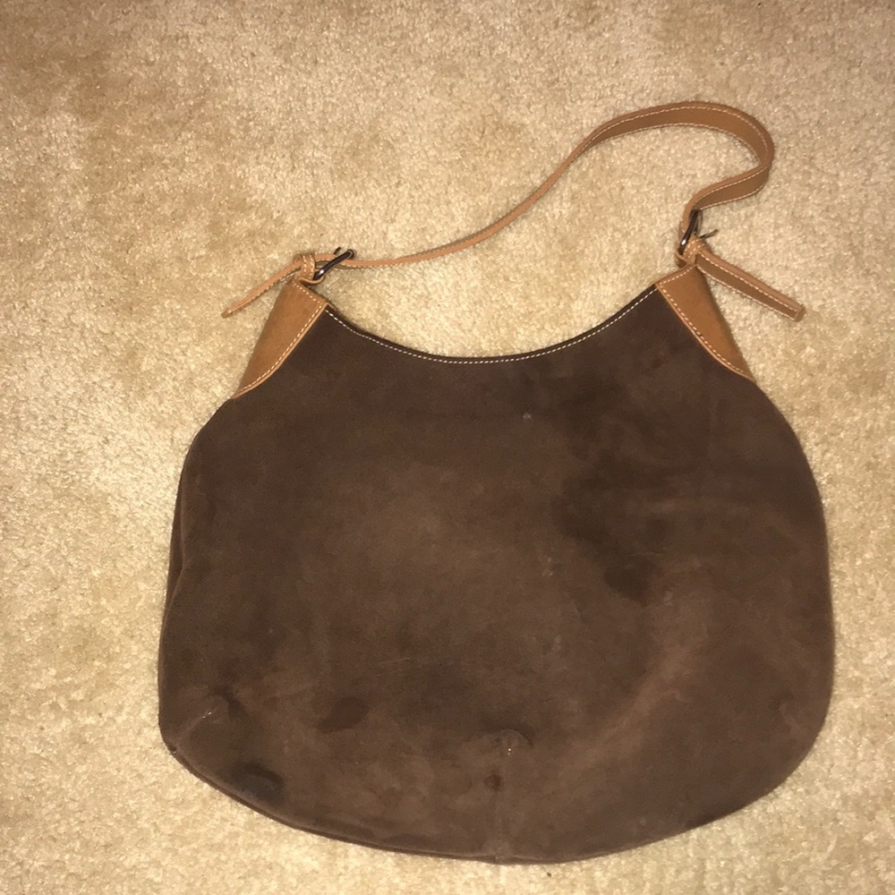 A brown suede purse